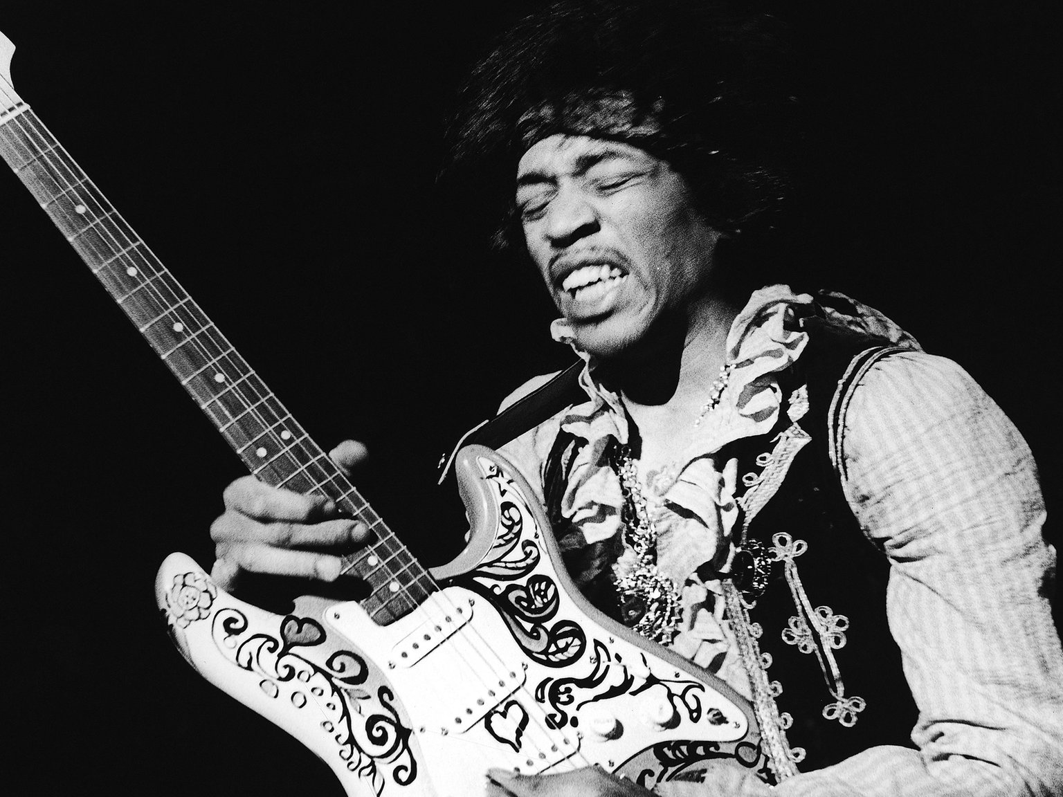 images/jimi-hendrix with Guitar